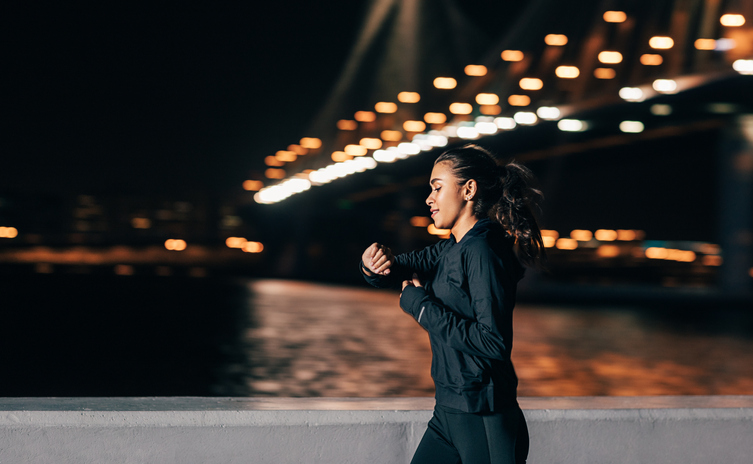 Woman jogging at night